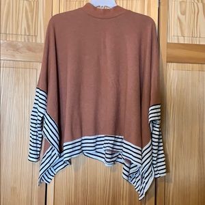 Lovely Melody turtleneck poncho with sleeves